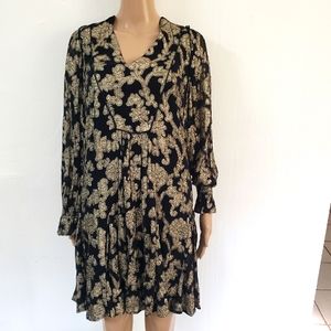Anthroplologie black and gold brocade print dress.